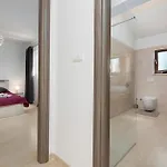 Re *